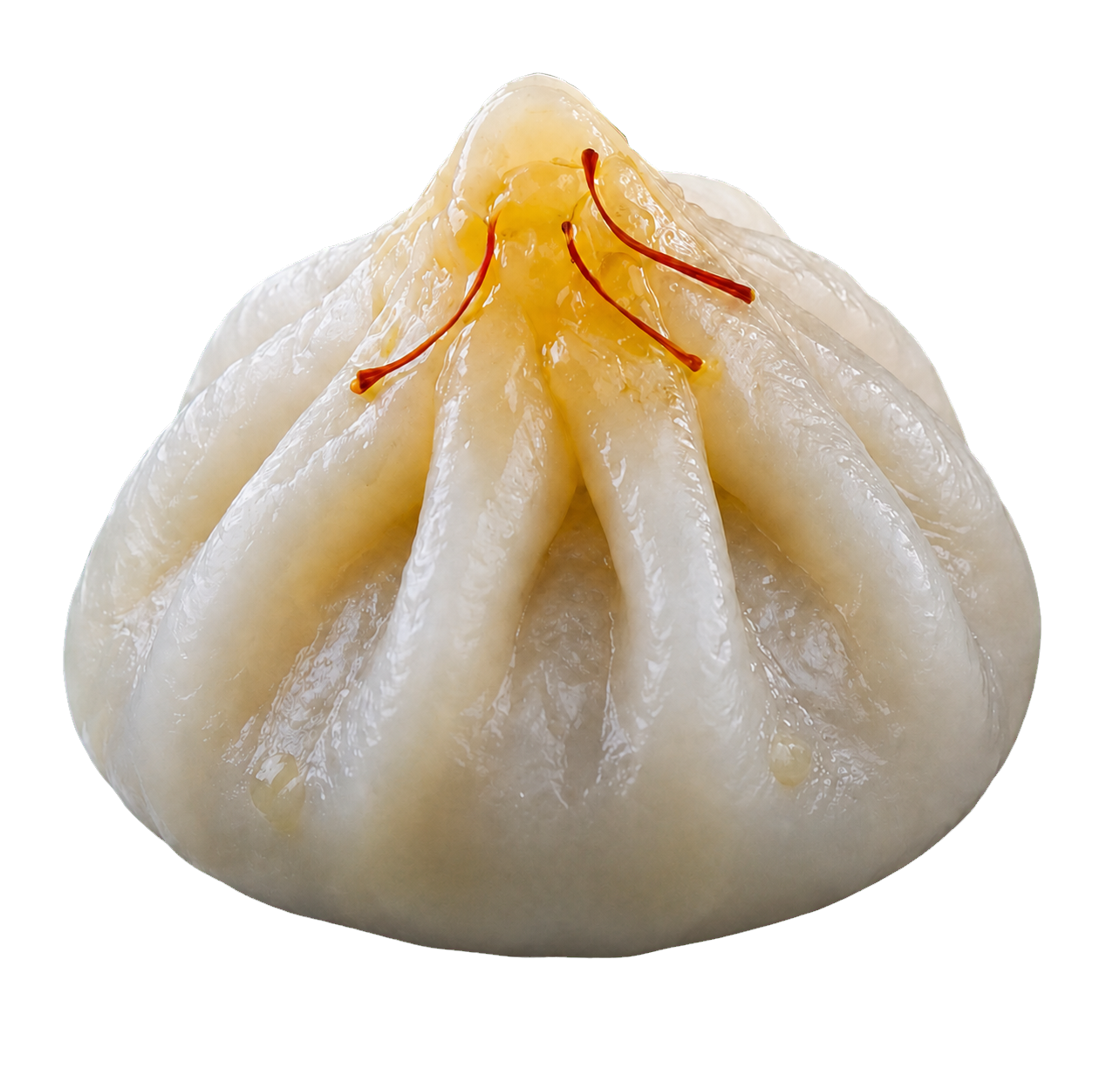 A freshly steamed Gauraai Ukadiche Modak finished with saffron